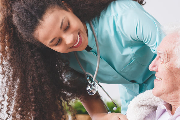 Nurse looking at her patient